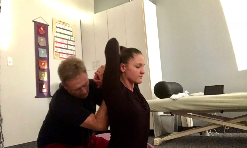 woman getting a thai massage 4